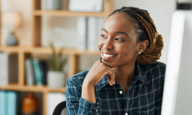 Student, woman thinking and computer for home e learning, online education and vision for future or opportunity. Young african person with ideas, brainstorming and happy with course or scholarship